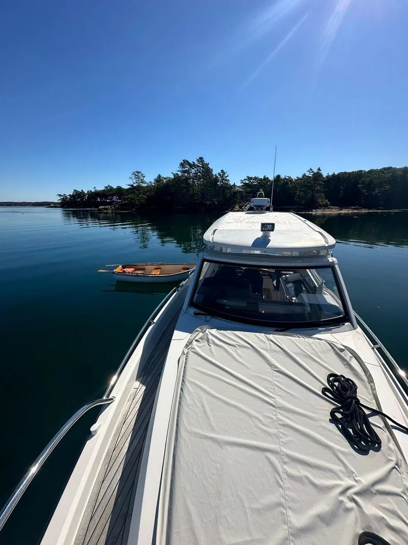 Slide: The Image of Nimbus W9 2021 boat on calm water, clear sky, scenic view. - 16