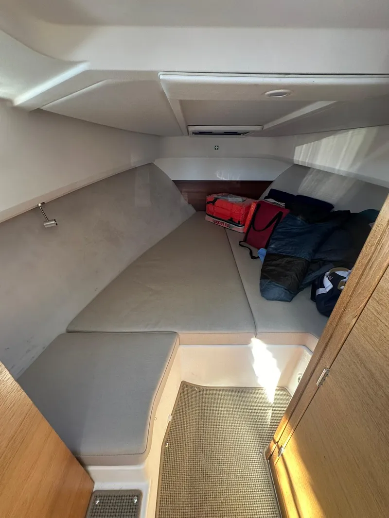 Slide: The Image of Interior cabin of 2021 Nimbus W9 boat with seating and storage. - 36