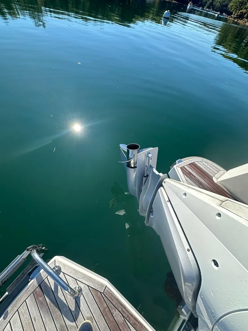 Slide: The Image of Nimbus W9 2021 boat on calm water with sun reflection. - 47