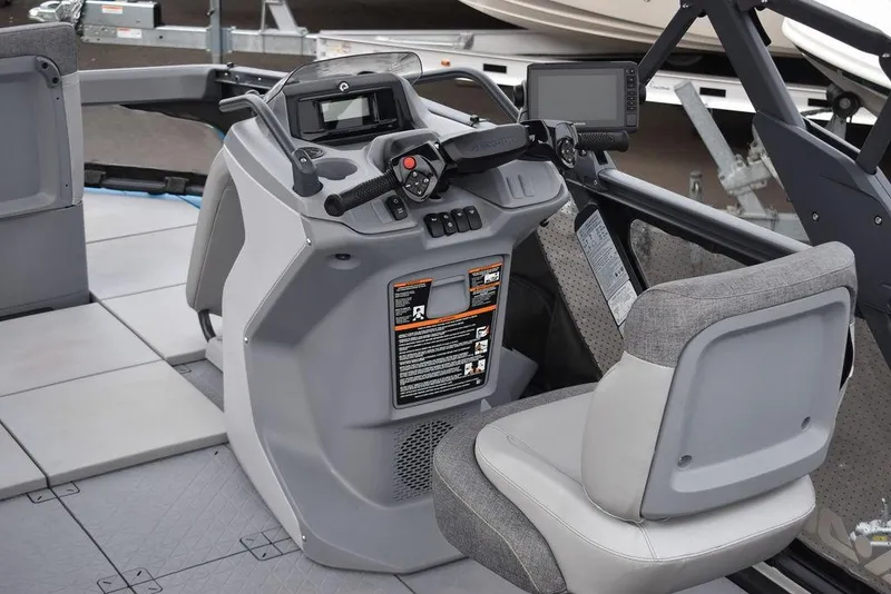 Slide: The Image of 2023 Sea-Doo Switch® Cruise 18-230 hp cockpit with steering console and seat. - 11