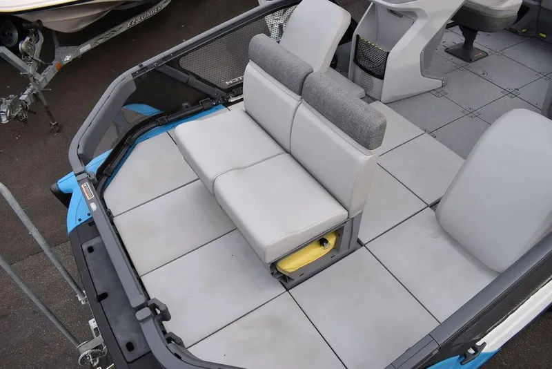 Slide: The Image of 2023 Sea-Doo Switch® Cruise 18-230 hp interior seating area with gray upholstery. - 12