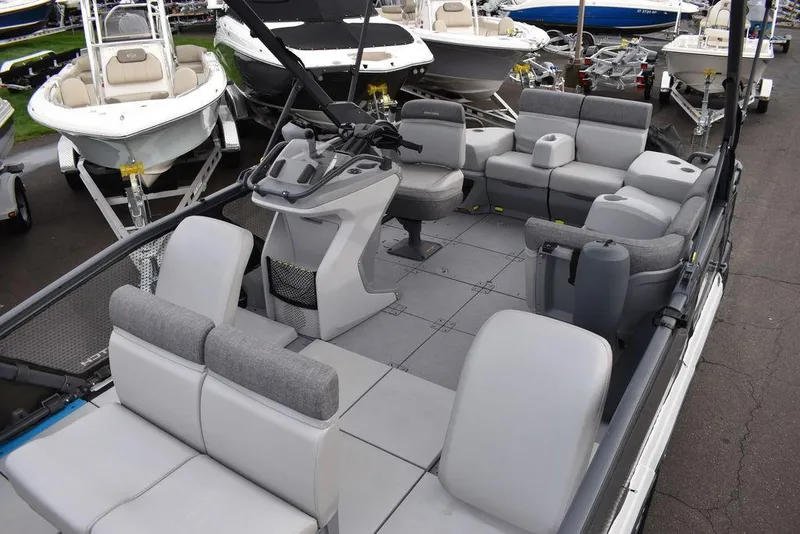 Slide: The Image of 2023 Sea-Doo Switch® Cruise 18-230 hp pontoon boat with spacious seating and modern design. - 13