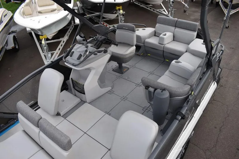 Slide: The Image of 2023 Sea-Doo Switch® Cruise 18-230 hp with spacious seating and modern design. - 17