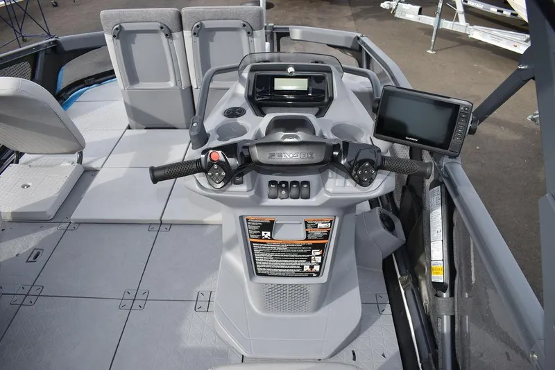 Slide: The Image of 2023 Sea-Doo Switch® Cruise 18-230 hp dashboard with steering and controls. - 26