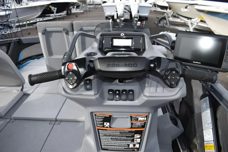 Slide: The Image of 2023 Sea-Doo Switch® Cruise 18-230 hp dashboard with controls and navigation display. - 30