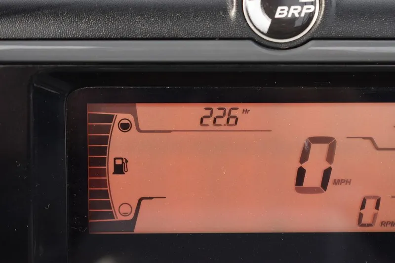 Slide: The Image of Dashboard display of 2023 Sea-Doo Switch® Cruise 18-230 hp, showing fuel gauge and hours. - 32