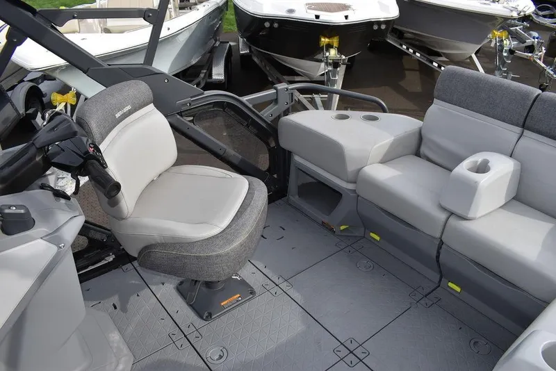 Slide: The Image of 2023 Sea-Doo Switch® Cruise 18-230 hp interior with seating and steering console. - 36