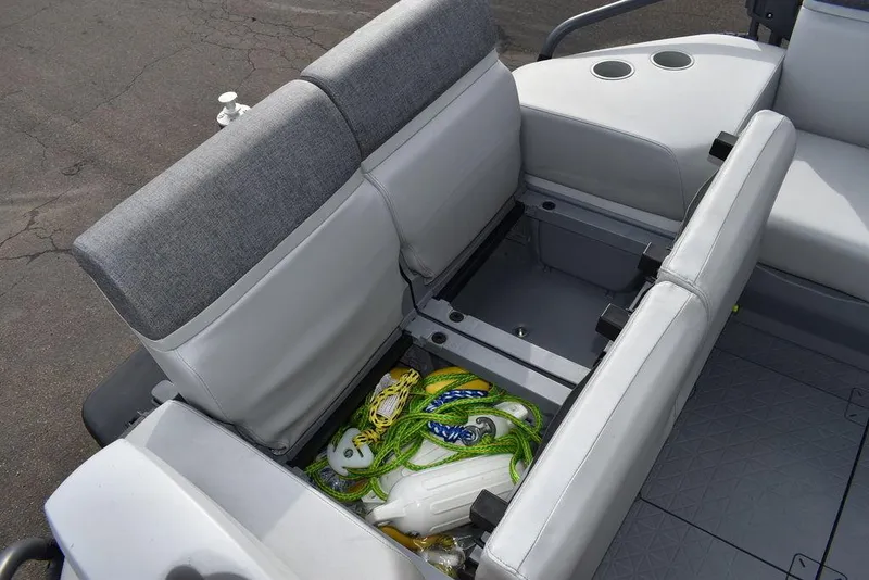 Slide: The Image of 2023 Sea-Doo Switch Cruise 18-230 hp boat interior with under-seat storage. - 38