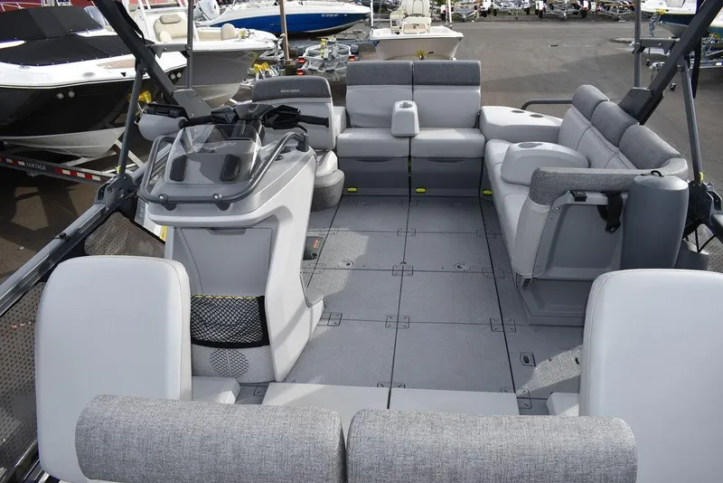 Slide: The Image of 2023 Sea-Doo Switch® Cruise 18-230 hp pontoon boat interior with spacious seating. - 45