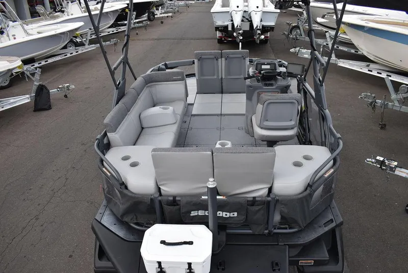 Slide: The Image of 2023 Sea-Doo Switch® Cruise 18-230 hp pontoon boat with spacious seating and modern design. - 6