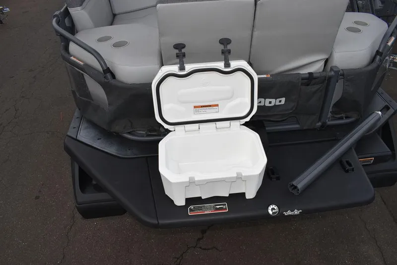Slide: The Image of 2023 Sea-Doo Switch® Cruise 18-230 hp with open storage compartment on deck. - 7