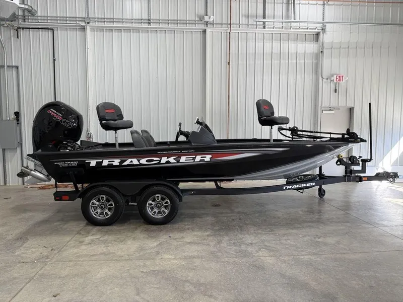 The Image of 2024 Tracker Pro Team™ 195 TXW Tournament Edition boat in a garage setting. - 1