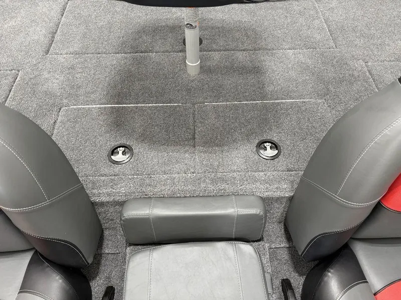 Slide: The Image of 2024 Tracker Pro Team™ 195 TXW Tournament Edition boat interior with gray seating and carpet. - 14