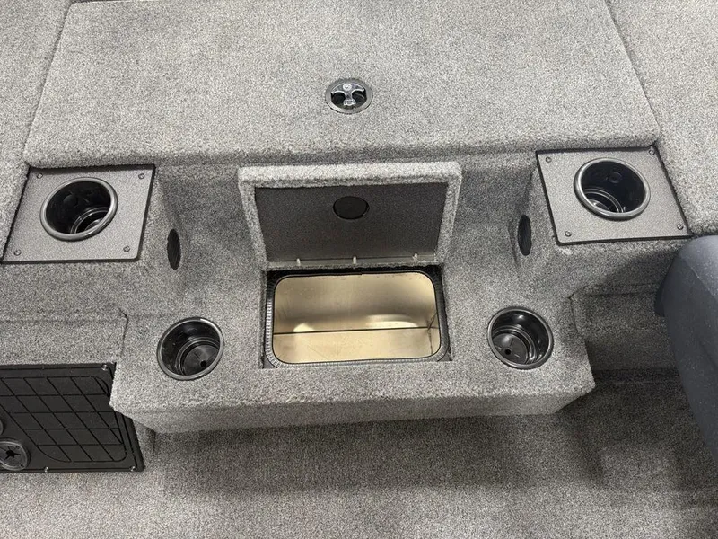 Slide: The Image of 2024 Tracker Pro Team™ 195 TXW Tournament Edition boat interior with cup holders and storage. - 21