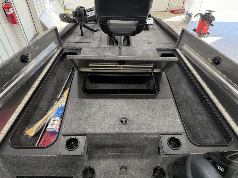 Slide: The Image of 2024 Tracker Pro Team™ 195 TXW Tournament Edition boat interior with storage compartments. - 9