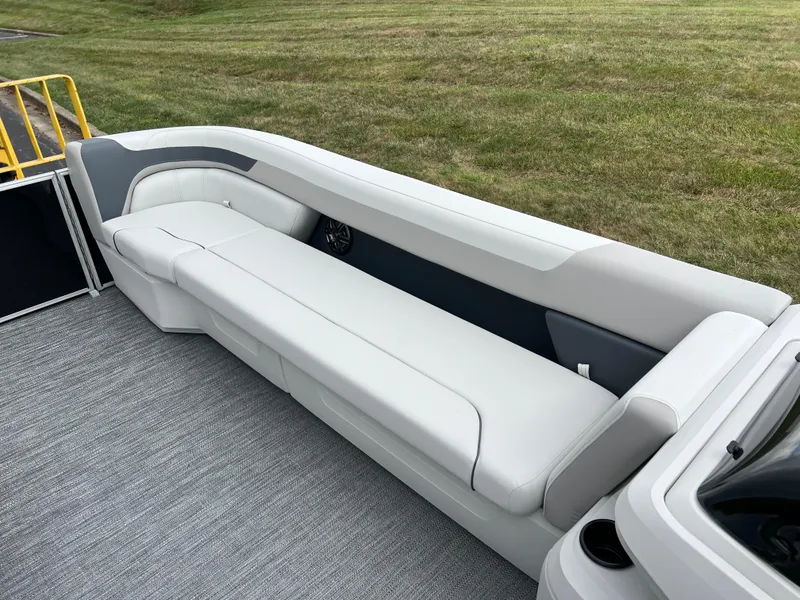 Slide: The Image of 2025 Godfrey Sweetwater 2286 C Special Edition boat interior with sleek white seating. - 27