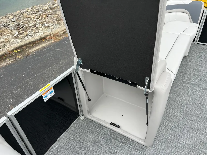 Slide: The Image of 2025 Godfrey Sweetwater 2286 C Special Edition boat interior storage compartment. - 29