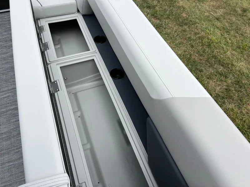 Slide: The Image of 2025 Godfrey Sweetwater 2286 C Special Edition boat seating with storage compartments. - 30