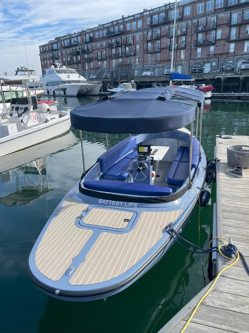 The Image of 2024 Vision Marine Technologies Fantail 217 electric boat docked at marina. - 0
