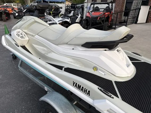 Slide: The Image of 2025 Yamaha Marine Waverunner VX Cruiser HO with audio, parked among other jet skis. - 6