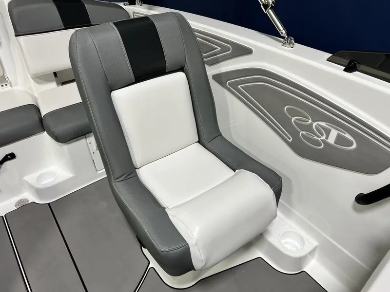 Slide: The Image of 2025 Tahoe T21 boat interior with gray and white seating and stylish design accents. - 11