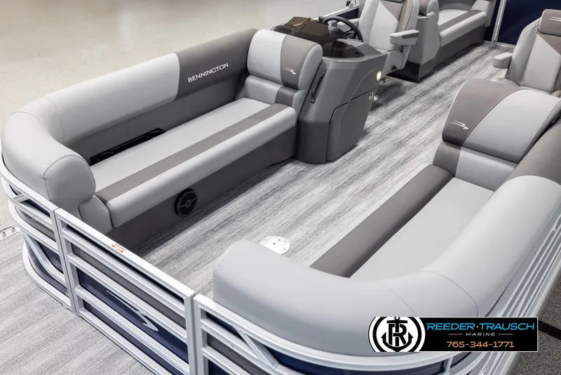 Slide: The Image of 2025 Bennington 23 SSRSE pontoon boat interior with gray seating and modern helm. - 10