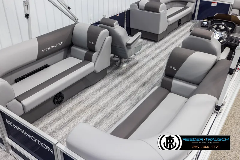 Slide: The Image of 2025 Bennington 23 SSRSE pontoon boat interior with gray seating and modern design. - 12