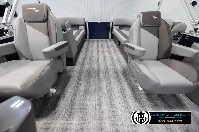 Slide: The Image of Interior of 2025 Bennington 23 SSRSE pontoon boat with luxurious seating and modern design. - 14