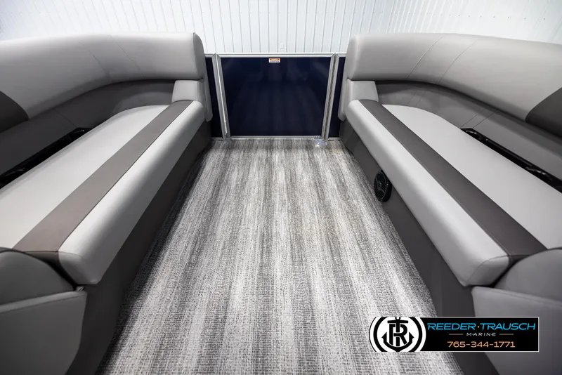 Slide: The Image of Interior of 2025 Bennington 23 SSRSE pontoon boat with gray seating and flooring. - 15