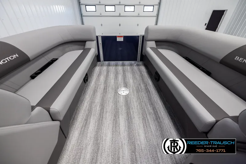 Slide: The Image of 2025 Bennington 23 SSRSE pontoon boat interior with gray seating and carpeted floor. - 18