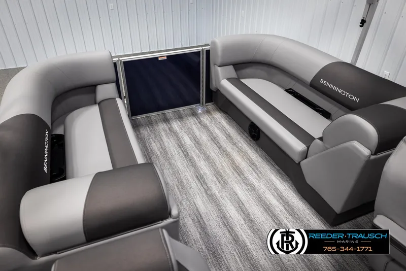 Slide: The Image of 2025 Bennington 23 SSRSE boat interior with gray seating and carpeted flooring. - 21
