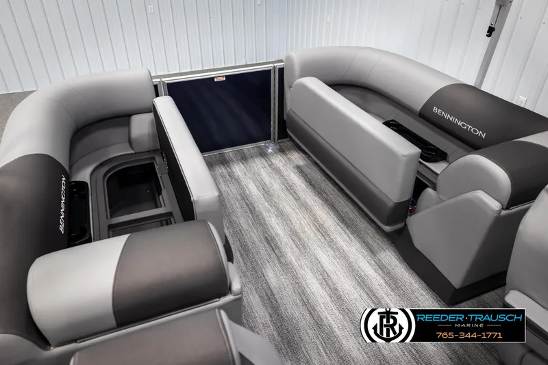 Slide: The Image of Interior of 2025 Bennington 23 SSRSE pontoon boat with gray seating and carpet flooring. - 22