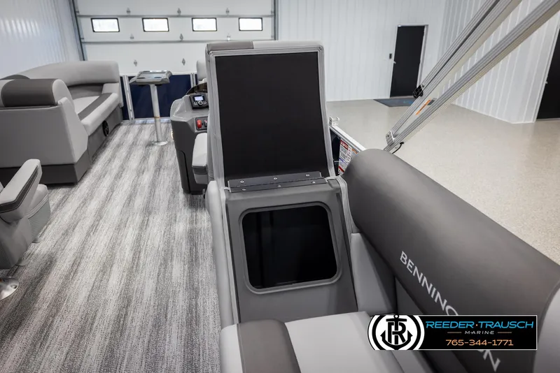 Slide: The Image of 2025 Bennington 23 SSRSE pontoon boat interior with seating and storage compartments. - 24