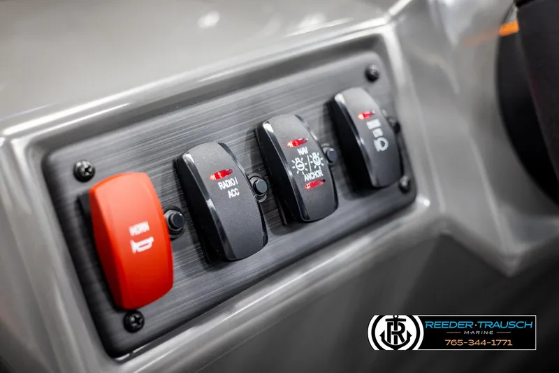 Slide: The Image of Control panel of 2025 Bennington 23 SSRSE boat with labeled switches. - 28