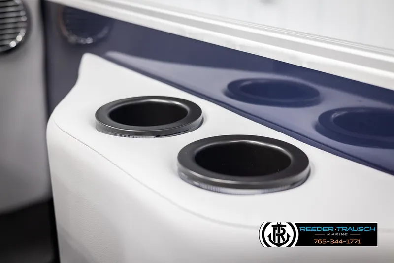 Slide: The Image of 2025 Bennington 23 SSRSE boat cup holders, sleek design, Reeder-Trausch Marine branding. - 40