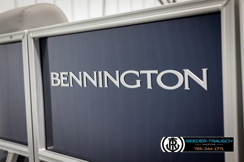 Slide: The Image of 2025 Bennington 23 SSRSE boat panel with logo, Reeder-Trausch Marine branding. - 48