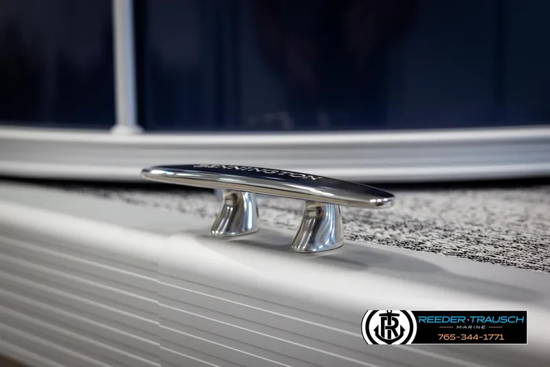 Slide: The Image of 2025 Bennington 23 SSRSE boat cleat detail with Reeder-Trausch Marine logo. - 49