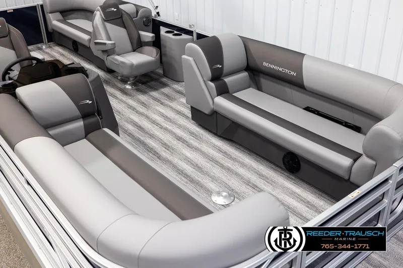 Slide: The Image of 2025 Bennington 23 SSRSE pontoon boat interior with gray seating and modern design. - 9