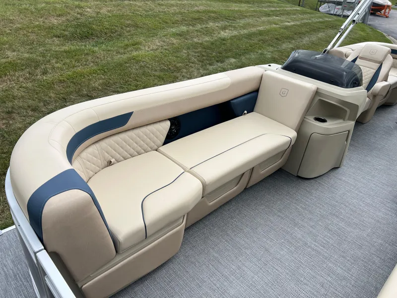 Slide: The Image of 2025 Godfrey SWEETWATER 2286 SB pontoon boat with beige seating and modern design. - 12