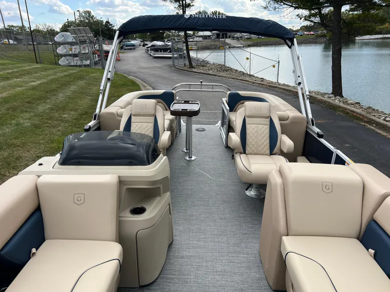 Slide: The Image of 2025 Godfrey SWEETWATER 2286 SB pontoon boat with luxurious seating and sleek design. - 15