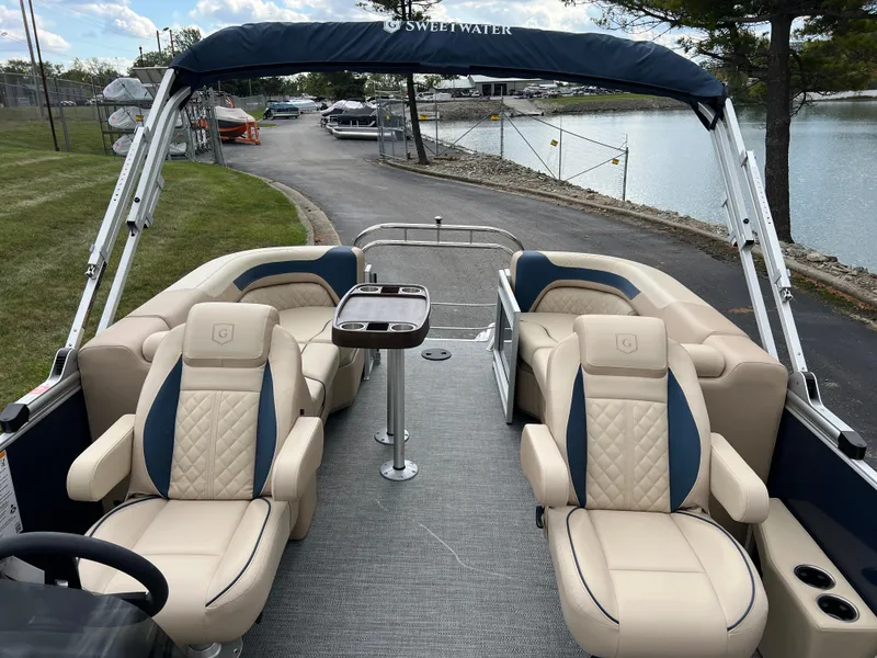 Slide: The Image of 2025 Godfrey SWEETWATER 2286 SB pontoon boat with luxurious seating and sleek design. - 16