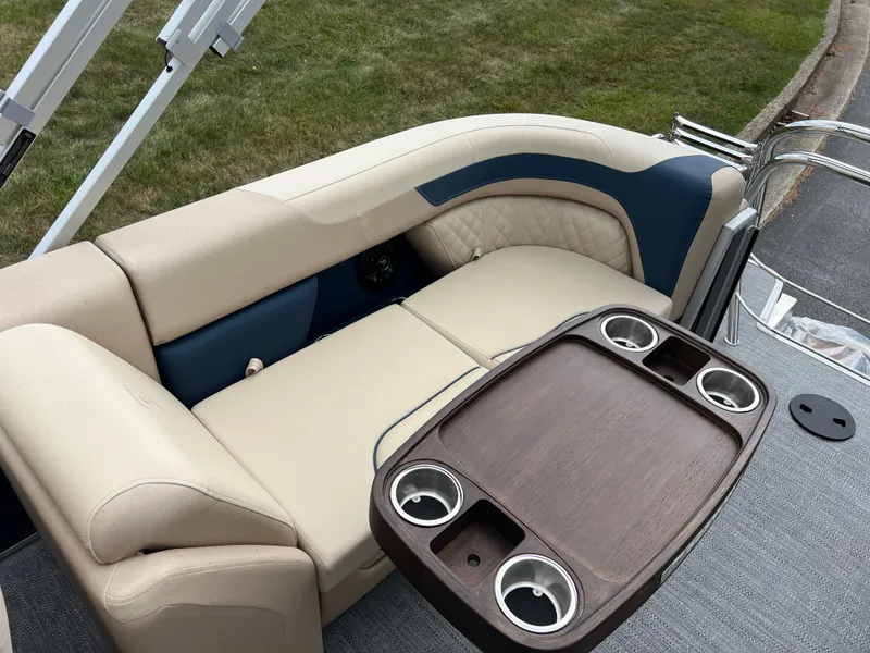 Slide: The Image of Luxurious seating area on 2025 Godfrey SWEETWATER 2286 SB pontoon boat with cupholders. - 20