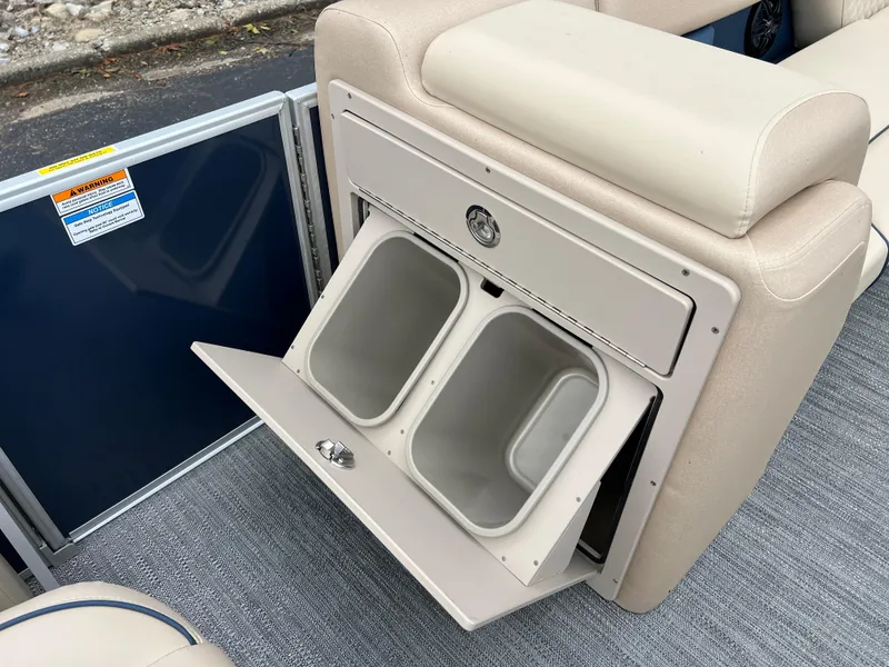 Slide: The Image of 2025 Godfrey SWEETWATER 2286 SB boat interior with dual storage compartments. - 26