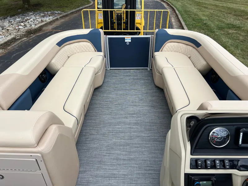 Slide: The Image of Interior view of 2025 Godfrey SWEETWATER 2286 SB pontoon boat with beige seating. - 32