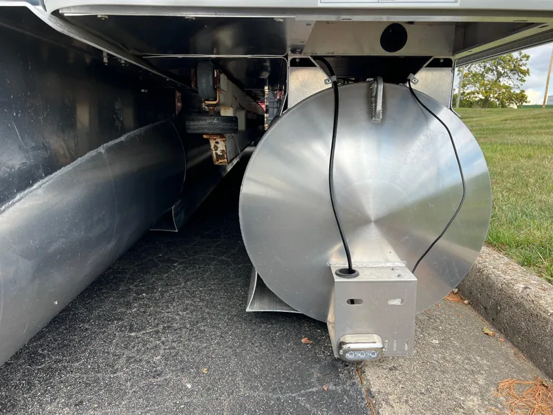 Slide: The Image of Underneath view of 2025 Godfrey SWEETWATER 2286 SB pontoon boat, showing metal components. - 7