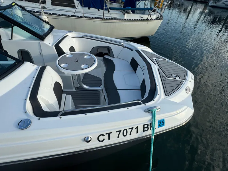 Slide: The Image of 2022 Monterey M-45 boat with seating area, docked in marina. - 15