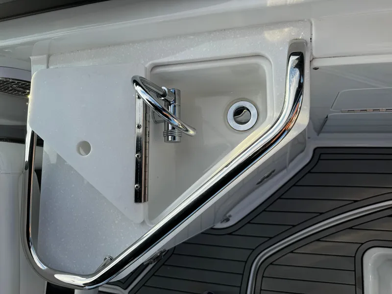 Slide: The Image of 2022 Monterey M-45 boat sink with chrome faucet and railing. - 18