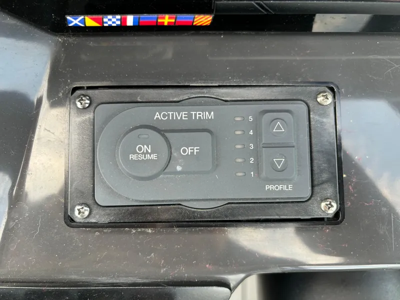 Slide: The Image of Active trim control panel on 2022 Monterey M-45 boat dashboard. - 19