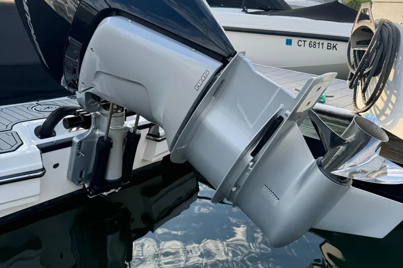 Slide: The Image of 2022 Monterey M-45 boat engine close-up, docked in water. - 20