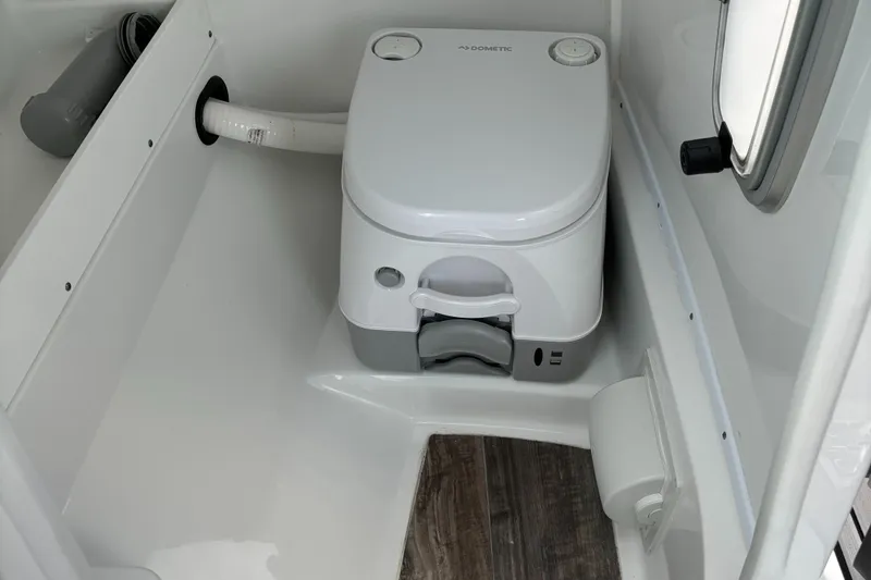 Slide: The Image of 2022 Monterey M-45 boat bathroom with compact toilet and modern design. - 24